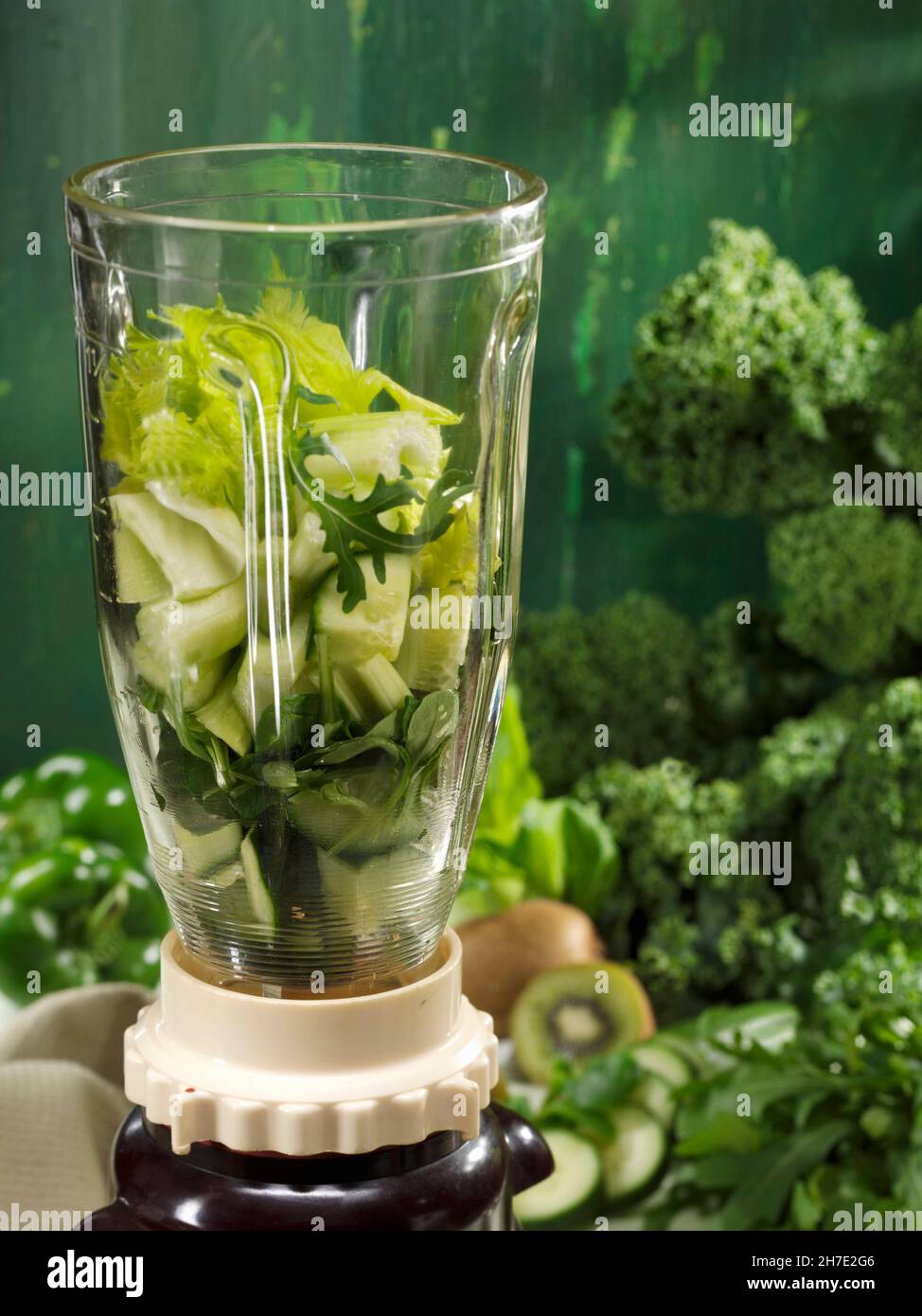 Ingredients for green smoothies in a mixer Stock Photo