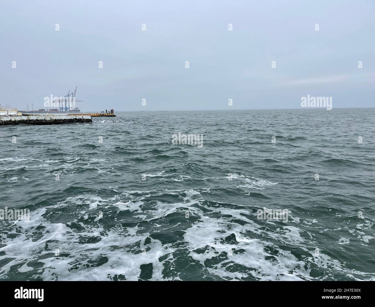 Seaview of Black sea, pier and harbour on the back Stock Photo - Alamy