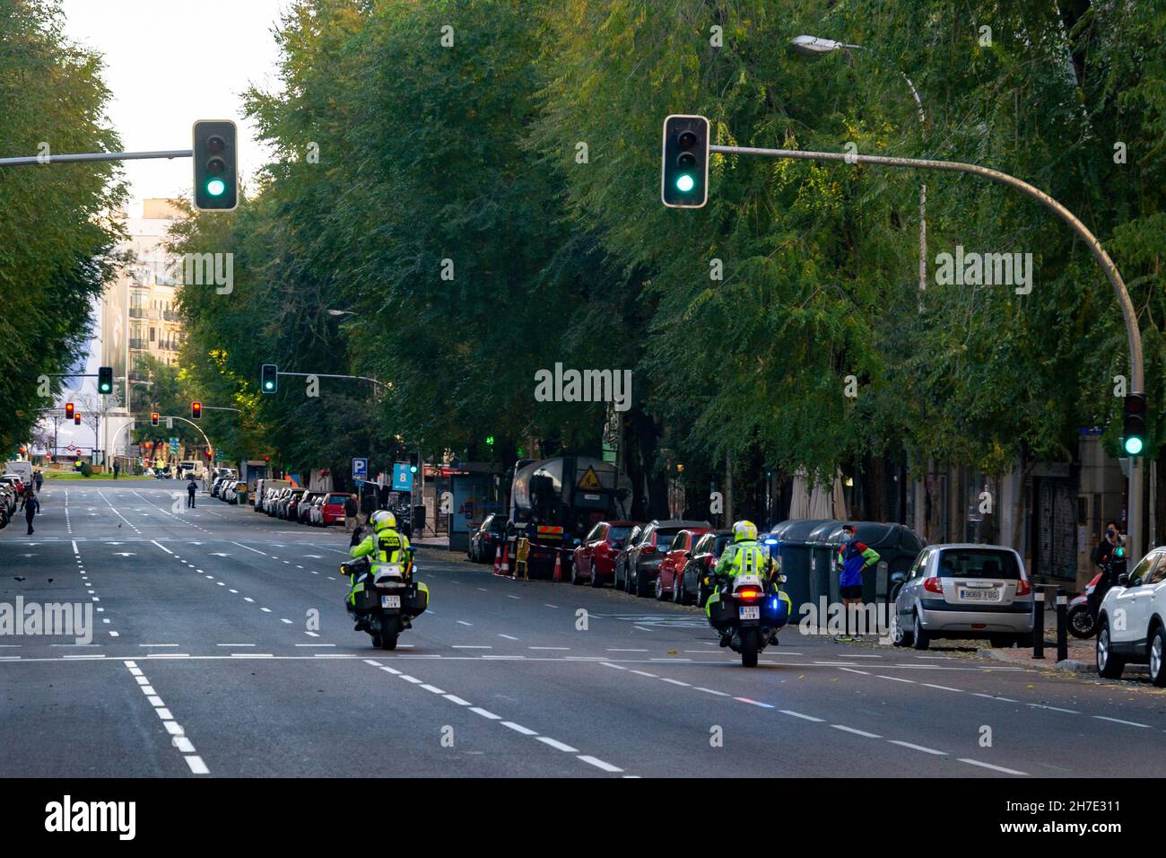 Streets, roads and highways of Madrid empty of cars while some people