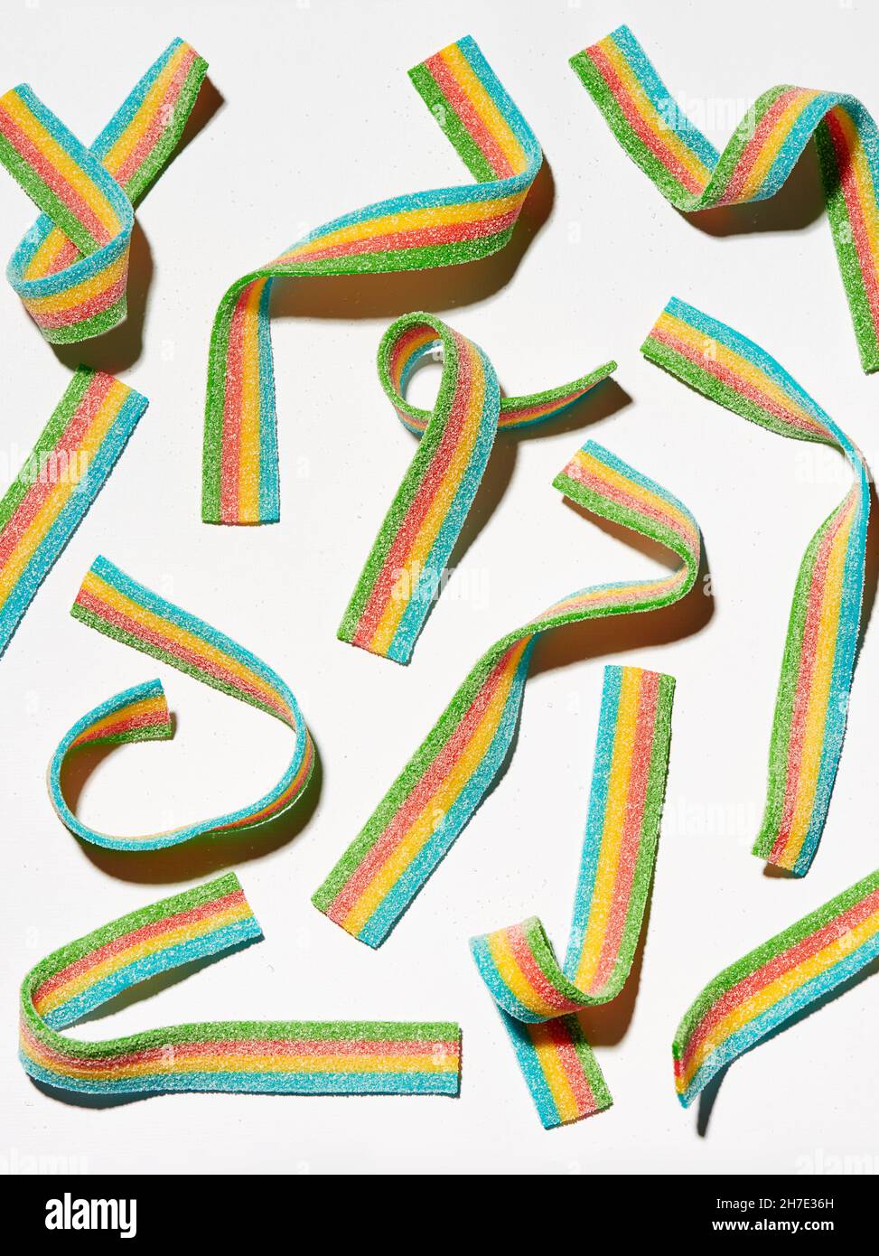 Four-colored fruit gum strips on a white background Stock Photo