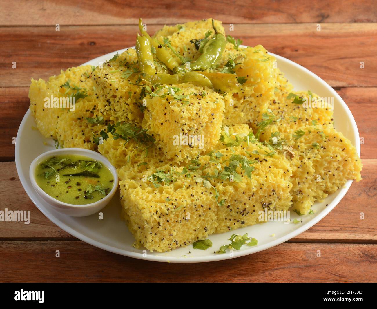 Indian Gujarati Khaman Dhokla made using Dal, served with Green chutney