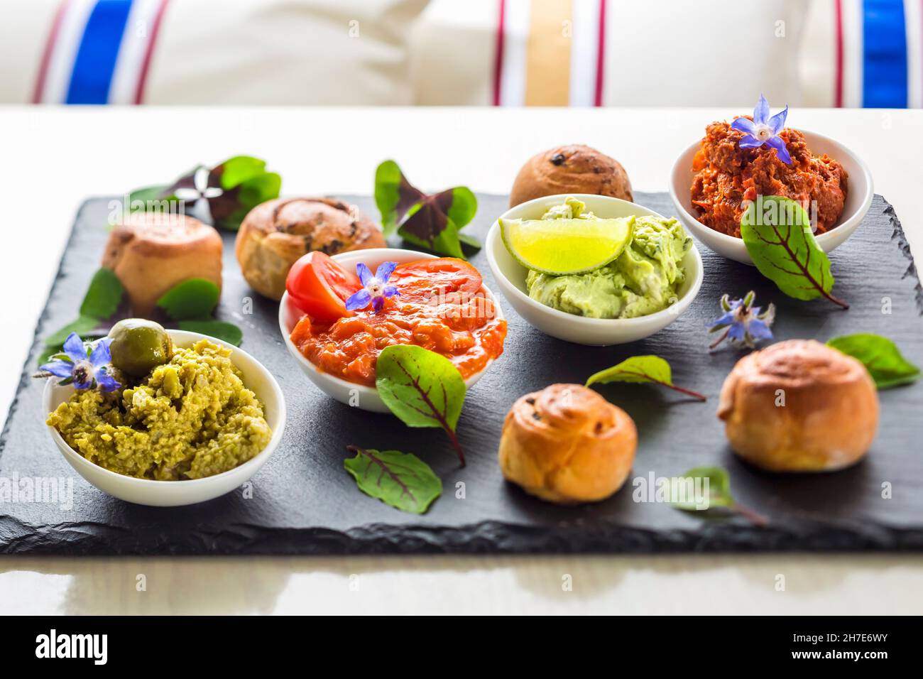 Olive and caper cream, tomato and garlic sauce, bread bean and mint