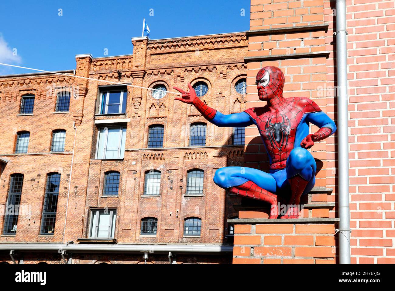 From the Colored Bodies Calendar 2022 - Geek Art-Bodypainting and Transformaking: Spider-Man photoshooting with Patrick at the Hefehof in Hamelin. A project by the photographer Tschiponnique Skupin and the bodypainter Enrico Lein. Stock Photo