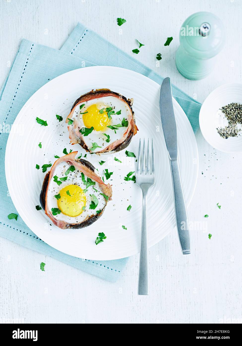 Portobello mushrooms with fried eggs Stock Photo Alamy