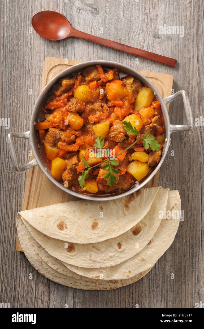 Lamb and potato ragout with tortillas (seen from above) Stock Photo