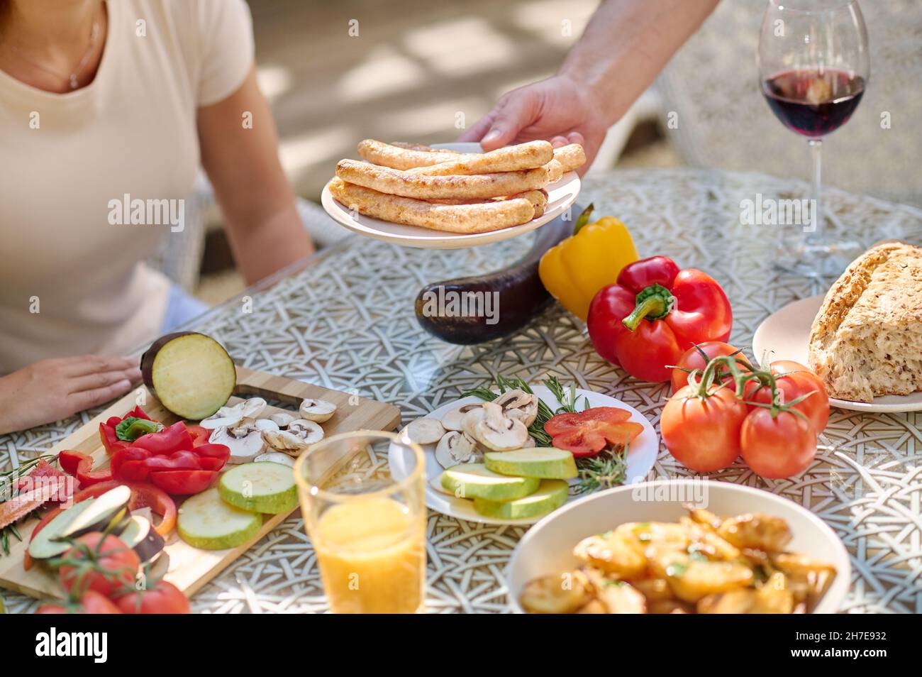 A close of a dinner tables with food on it Stock Photo