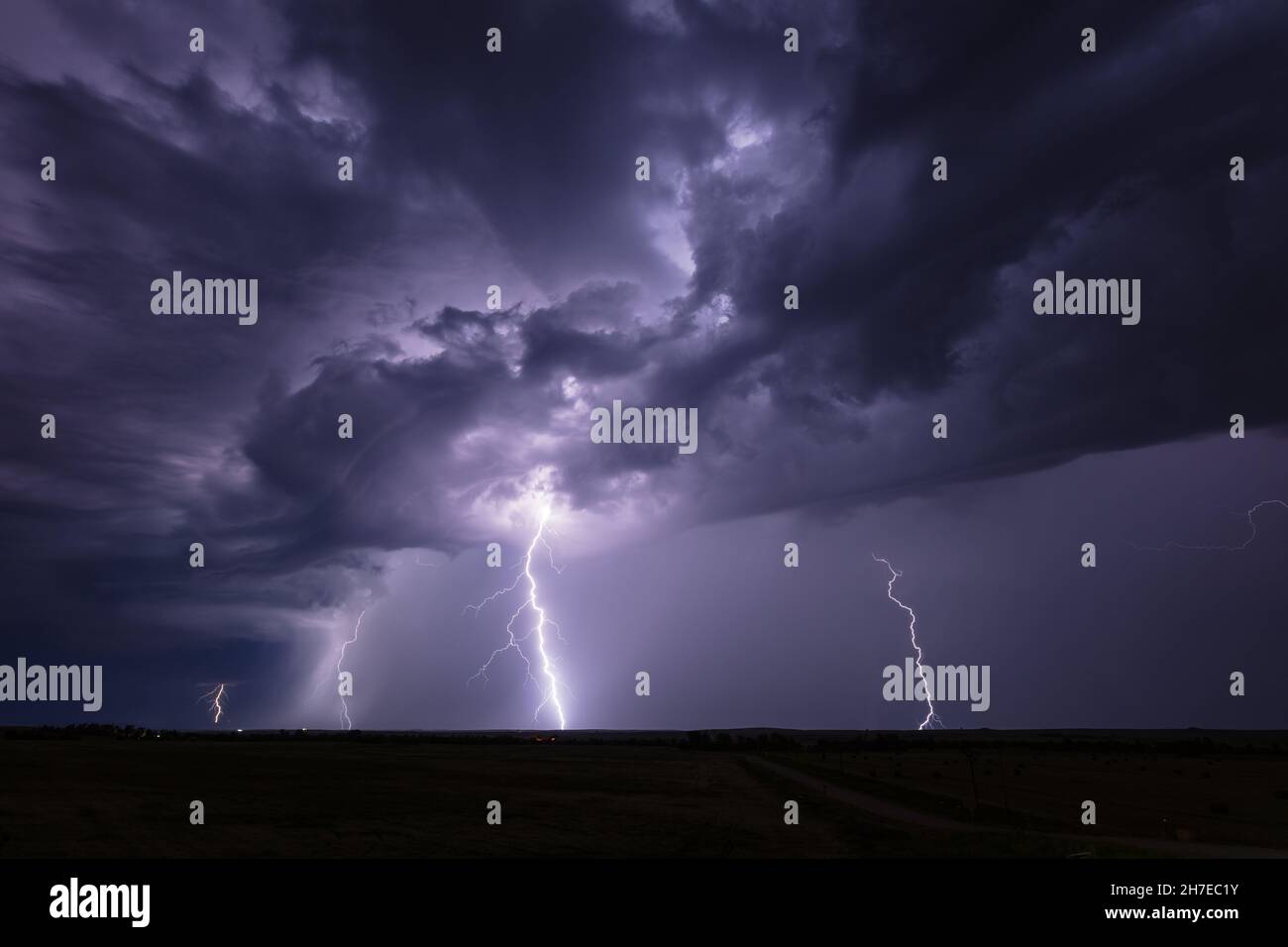 Lightning strikes in the night sky from a strong thunderstorm near Oelrichs, South Dakota Stock Photo