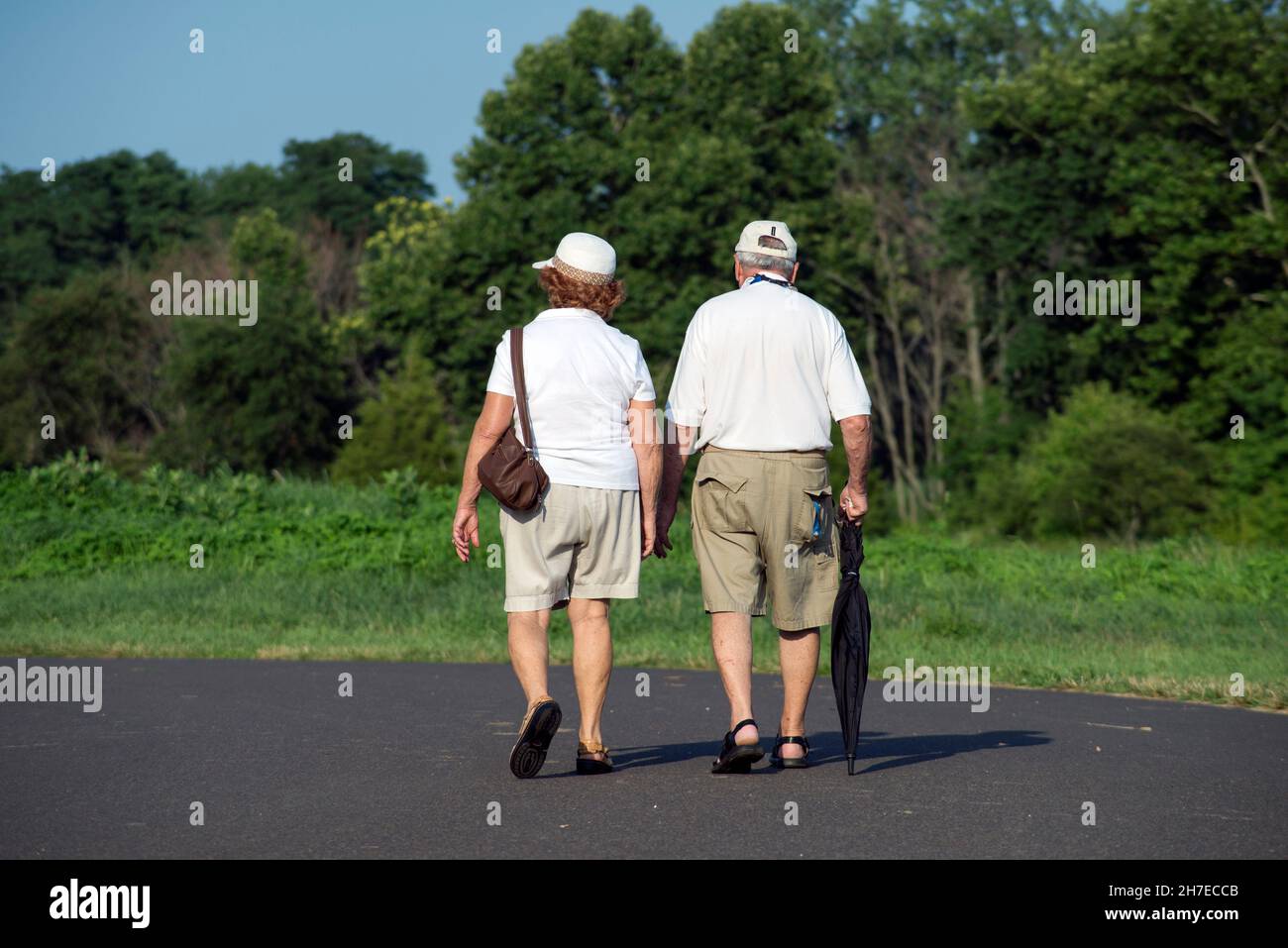 Old couple walking in the park, Pennsylvania, USA Stock Photo