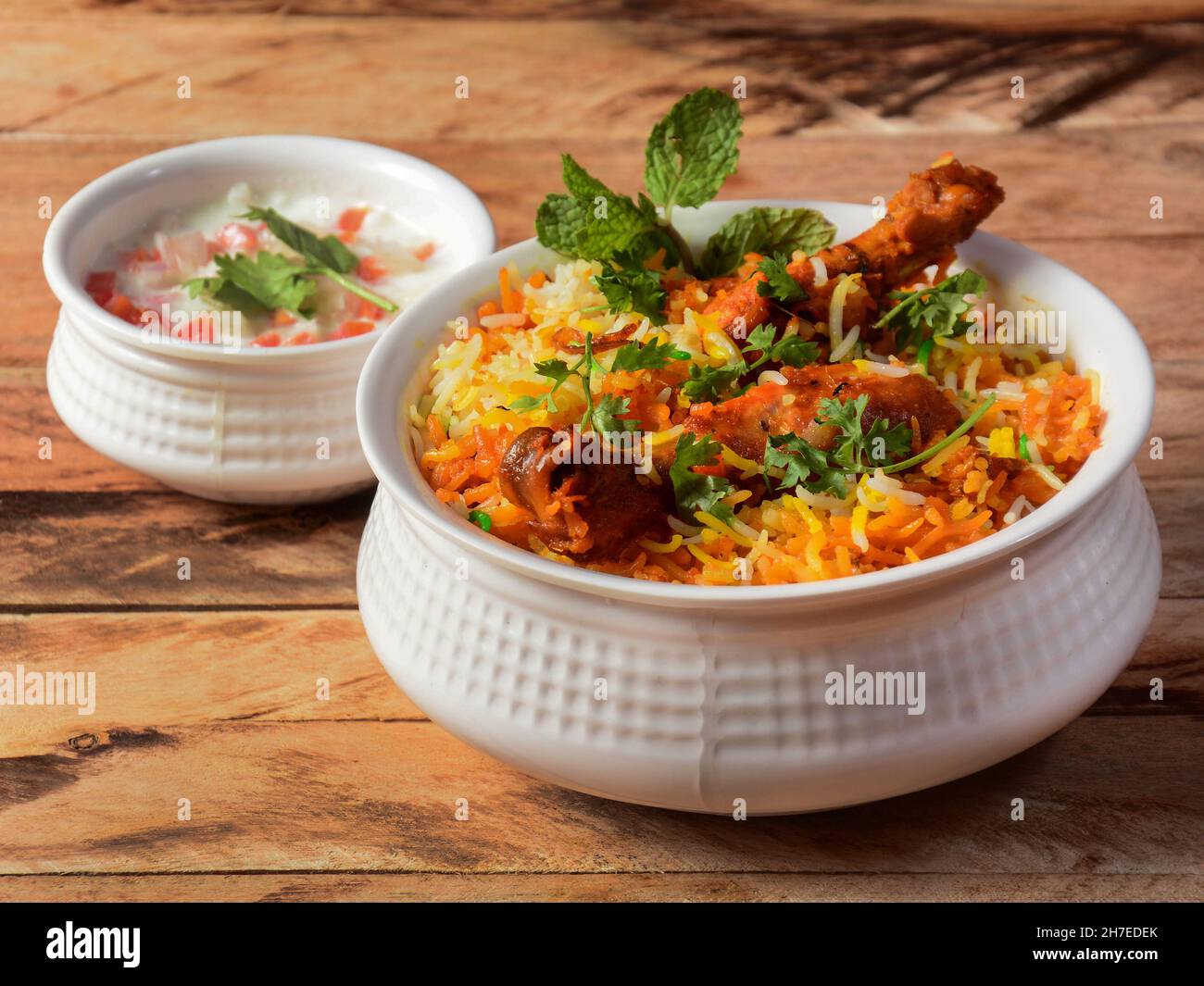 Traditional Hyderabadi Chicken dum Biryani made of Basmati rice cooked with masala spices