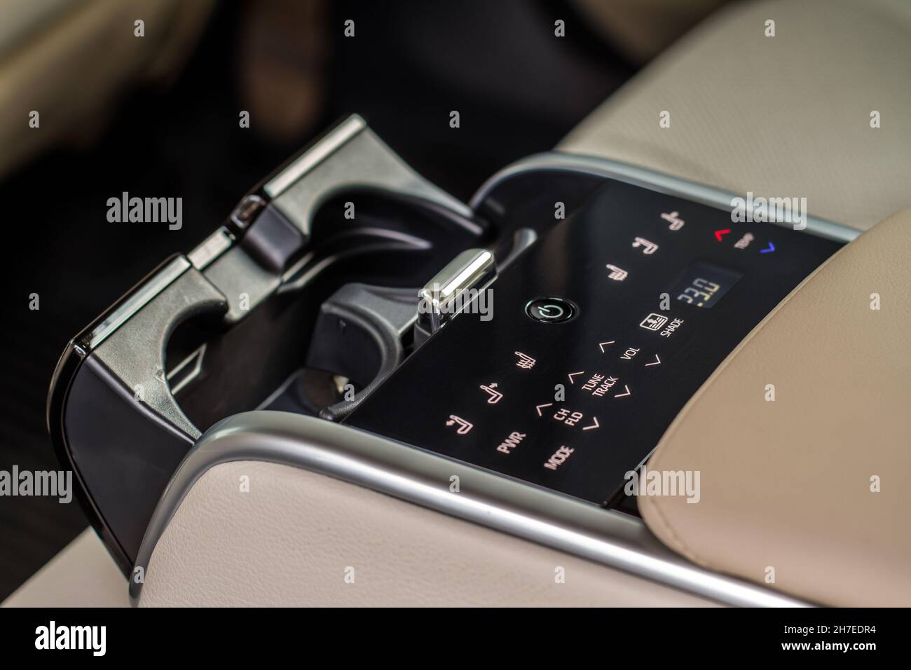 Car armrest opened. Opened armrest in the car for passenger with opened