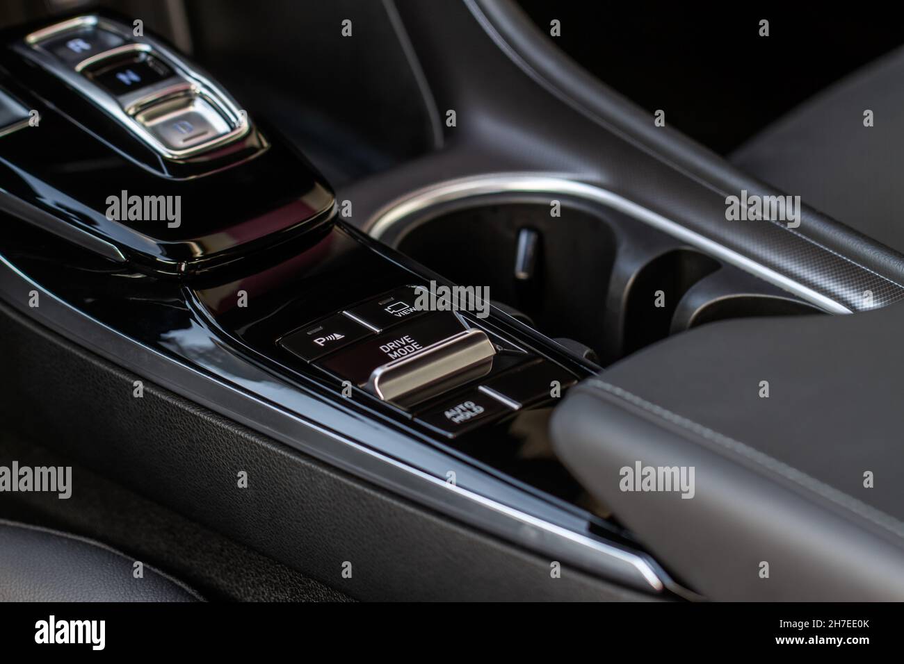 Drive selector button. Automatic gear lever and gear shift. Car