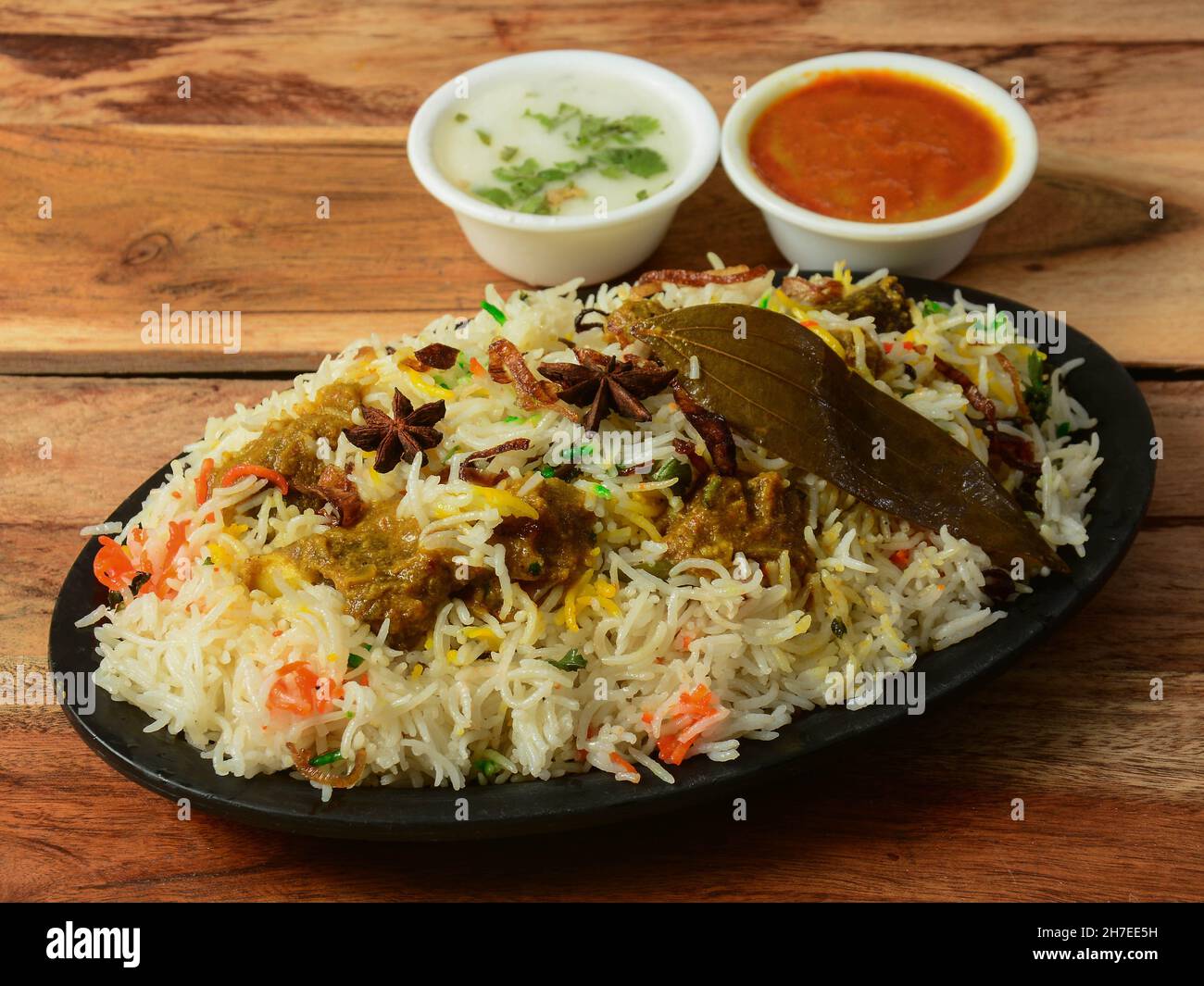 Kashmiri Mutton Gosht or Lamb Biryani prepared in Basmati Rice served