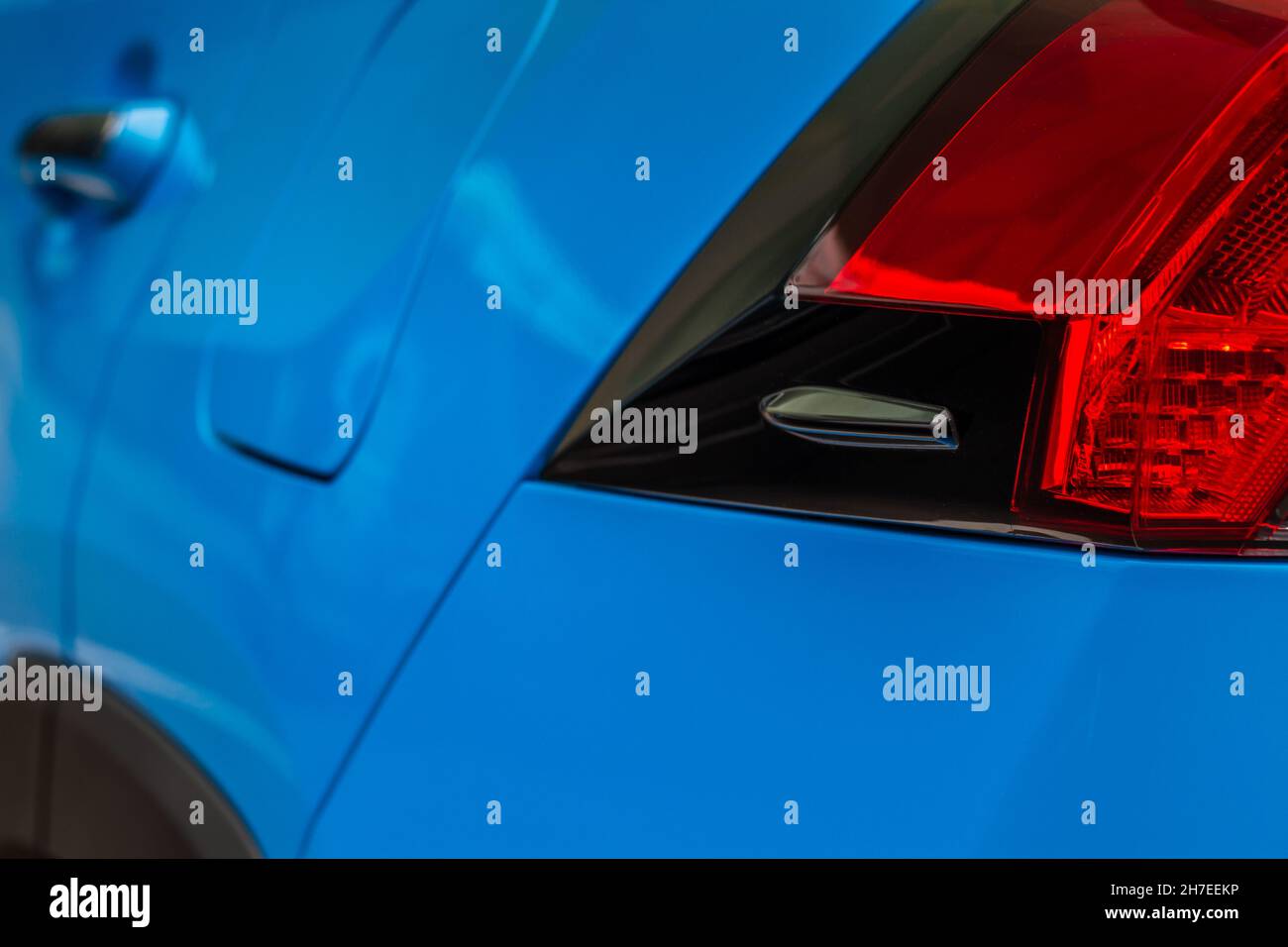 Modern rear light of a car. Brake light and arrow of large suv. Rear