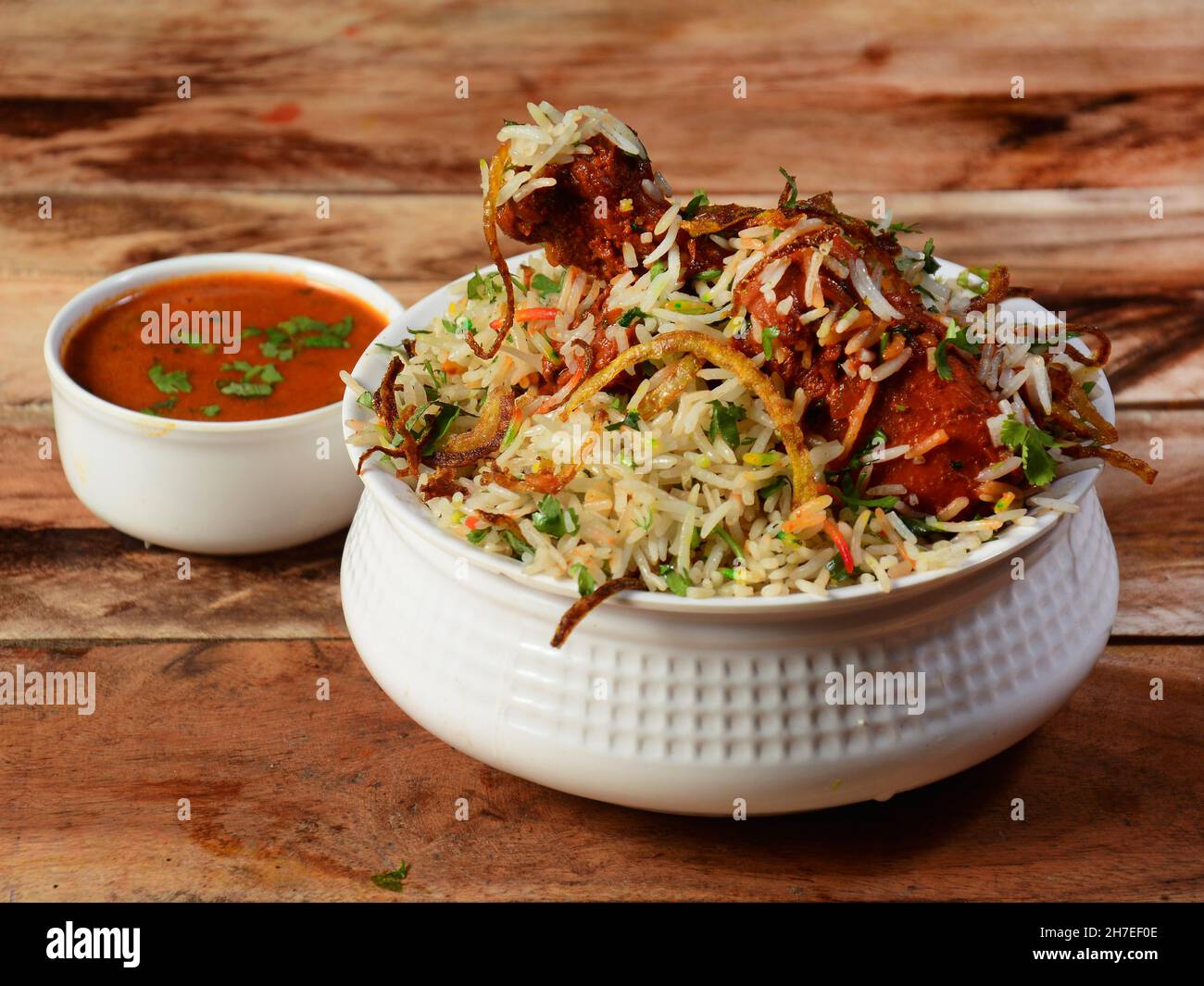 Traditional Hyderabadi Chicken dum Biryani made of Basmati rice cooked