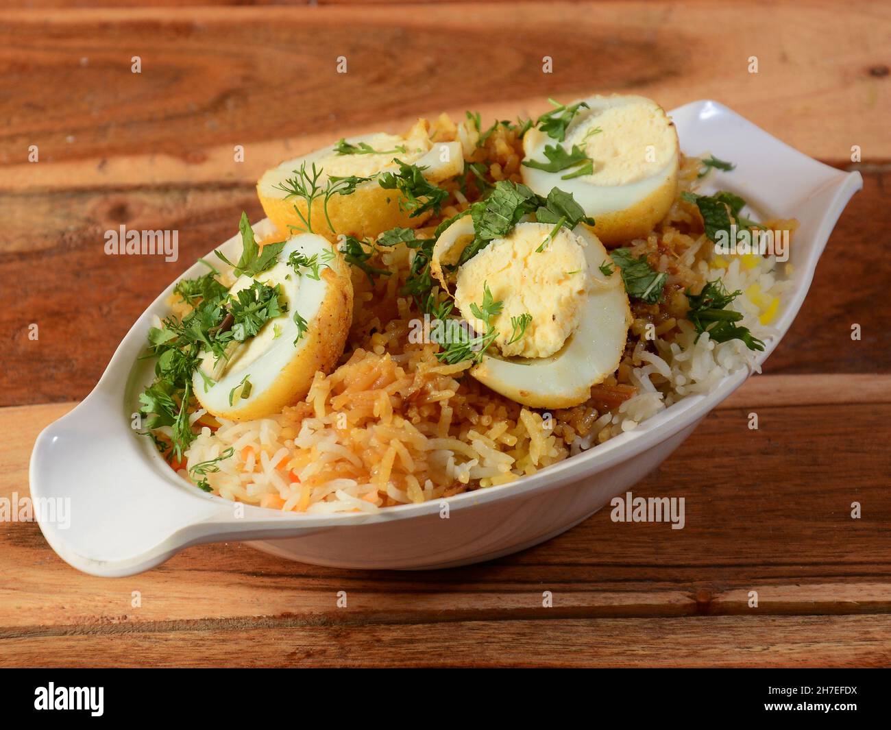 Egg Biryani Basmati rice cooked with masala and spices and served