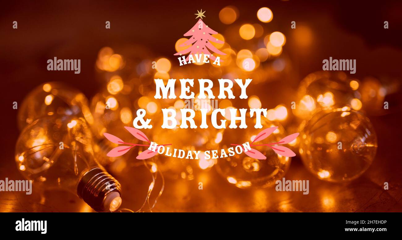 Image of merry christmas text over lightbulbs Stock Photo