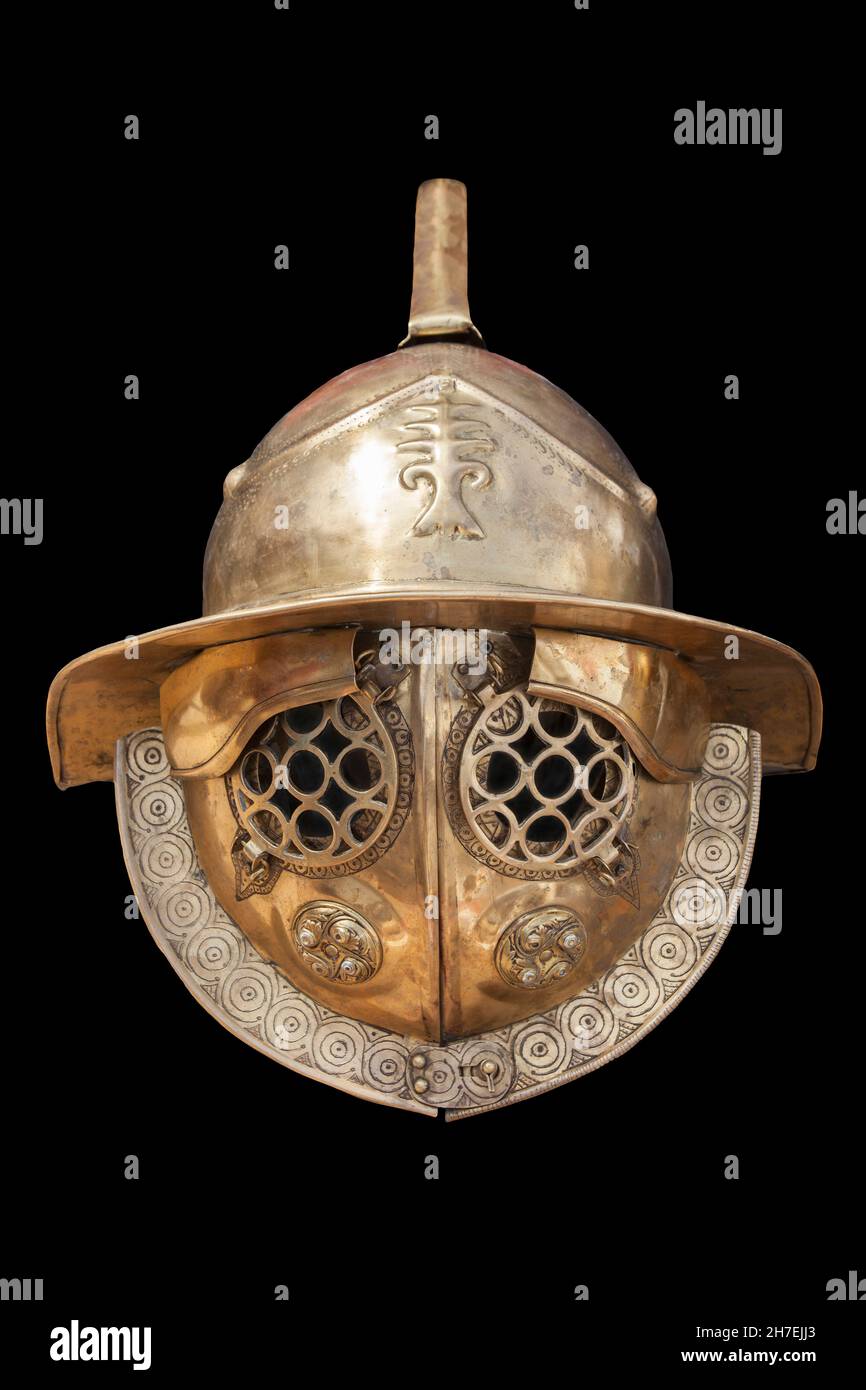 Thraex or thracian-class gladiator helmet. Isolated over black Stock Photo