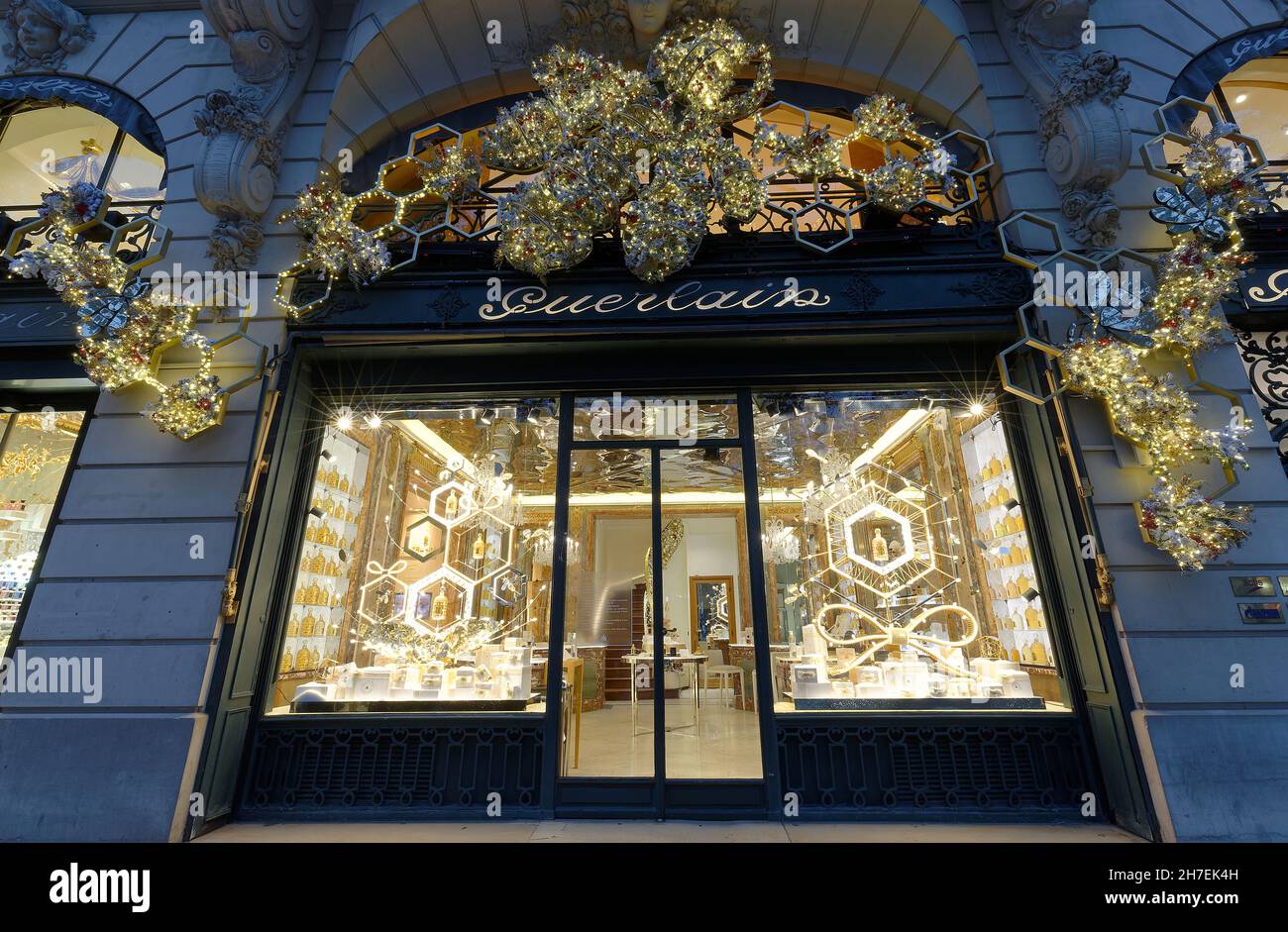 Guerlain store at Avenue des Champs-Elysees decorated for Christmas in Paris . Guerlain is one of the most premier luxury labels of fragrances in the Stock Photo