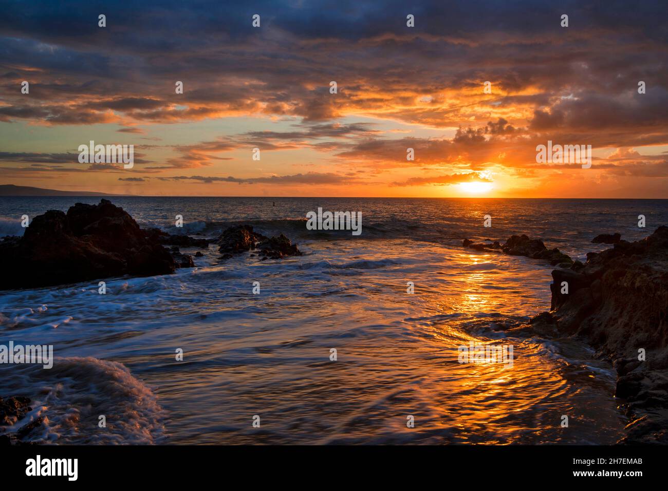 Beautiful Maui Sunset at Cove Beach Park, Kihei, Maui, Hawaii Stock Photo