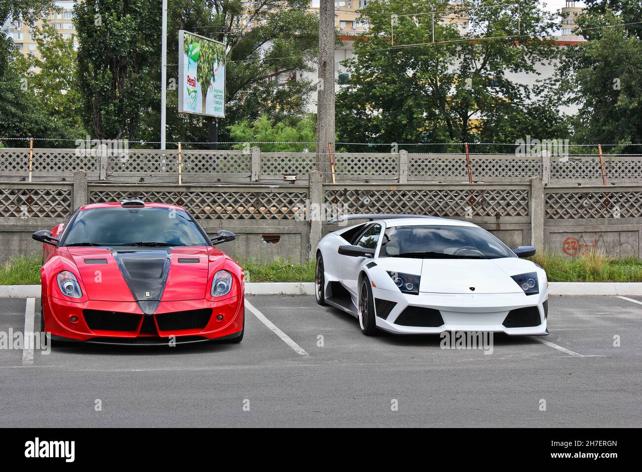 Kiev, Ukraine - July 30, 2011: Ferrari 599 GTB Fiorano Stallone Mansory and Lamborghini Murcielago IMSA Stock Photo