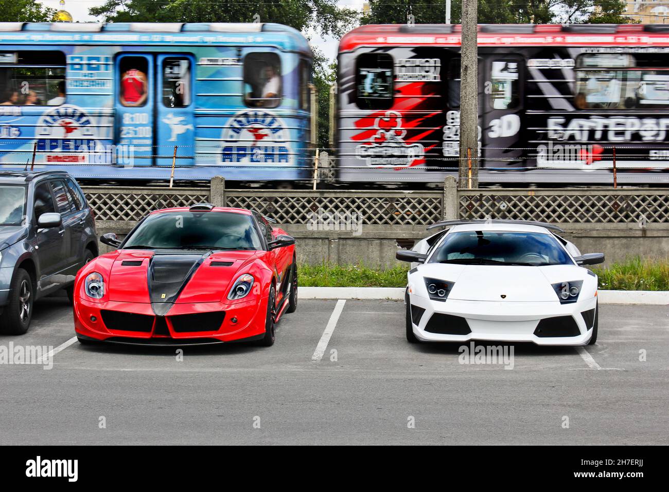 Kiev, Ukraine - July 30, 2011: Ferrari 599 GTB Fiorano Stallone Mansory and Lamborghini Murcielago IMSA Stock Photo