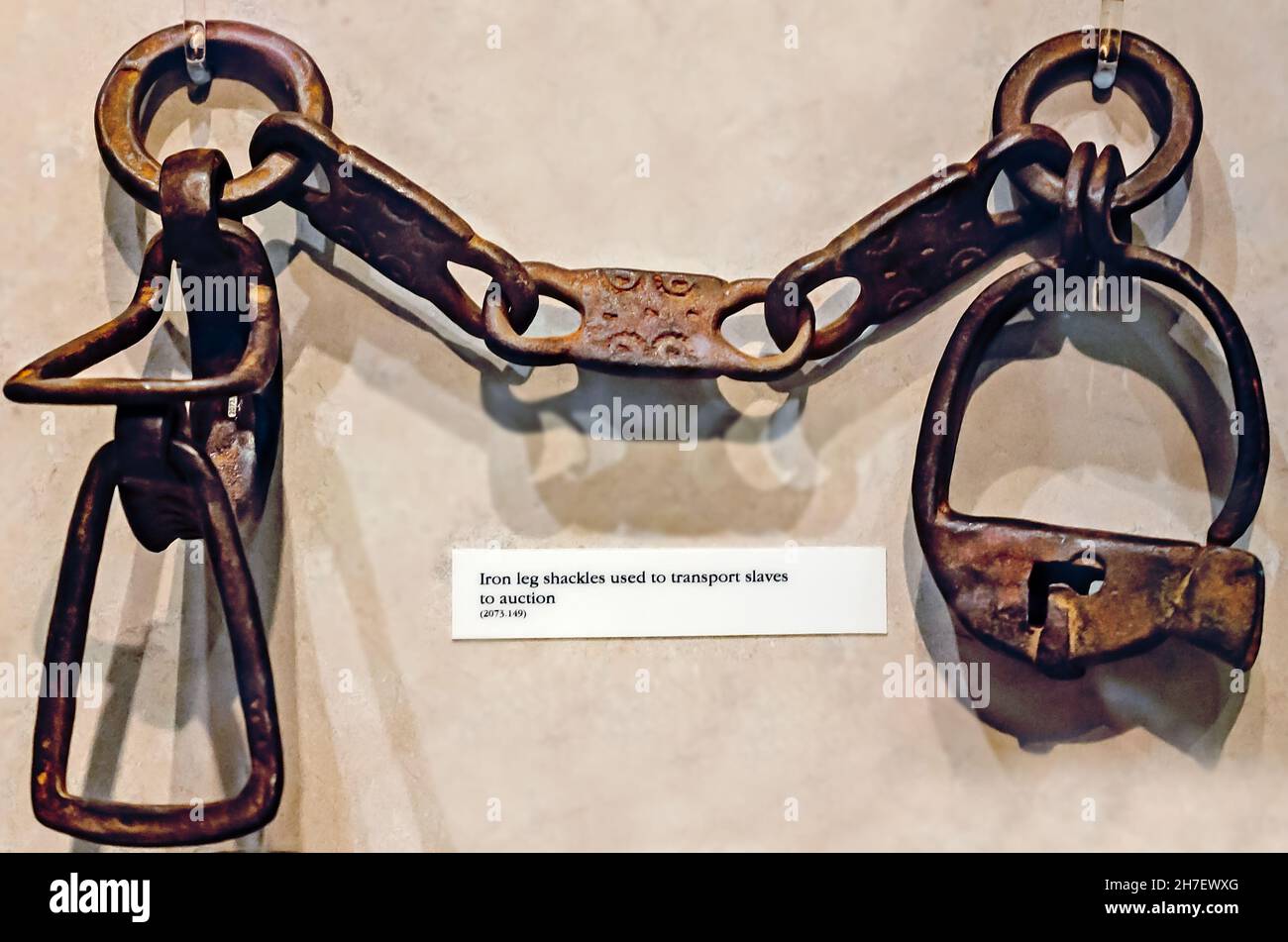 Iron leg shackles used to transport slaves to auction are displayed at the History Museum of Mobile, March 19, 2019, in Mobile, Alabama. Stock Photo