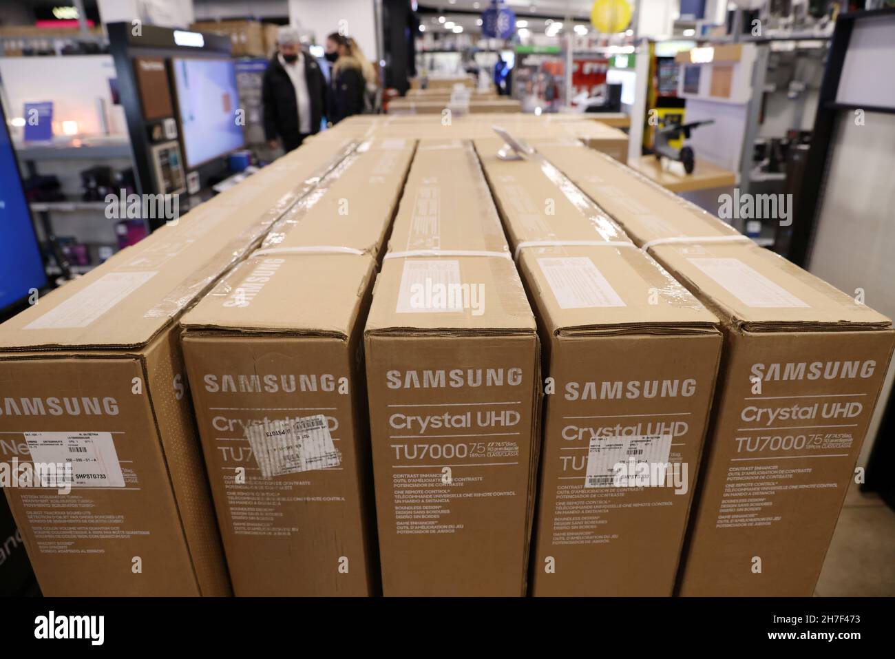 Boxes containing Samsung televisions are seen in a store in Manhattan, New York City, U.S., November 22, 2021. REUTERS/Andrew Kelly Stock Photo