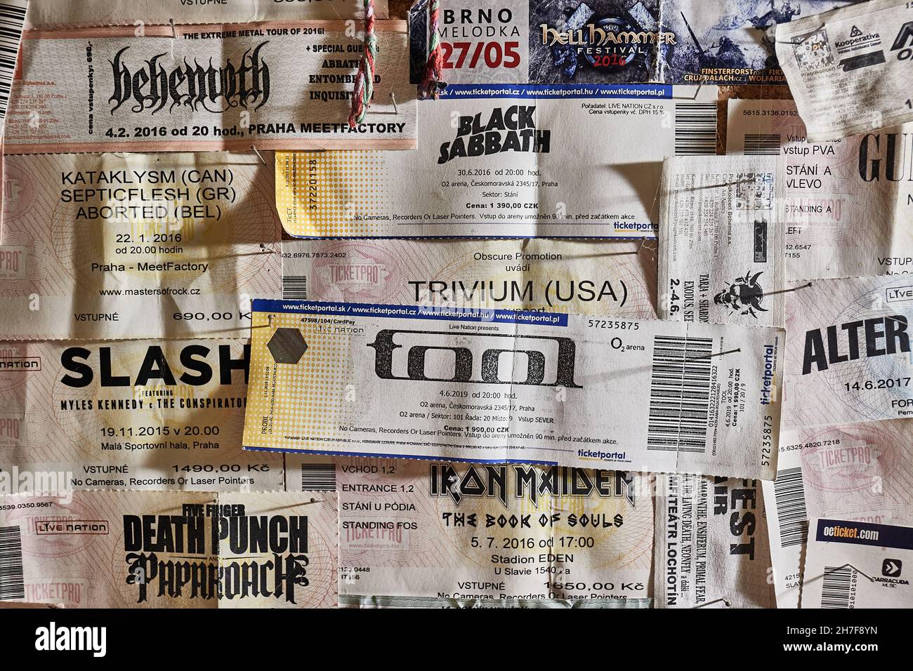 Concert tickets on a wall, rock and metal music Stock Photo