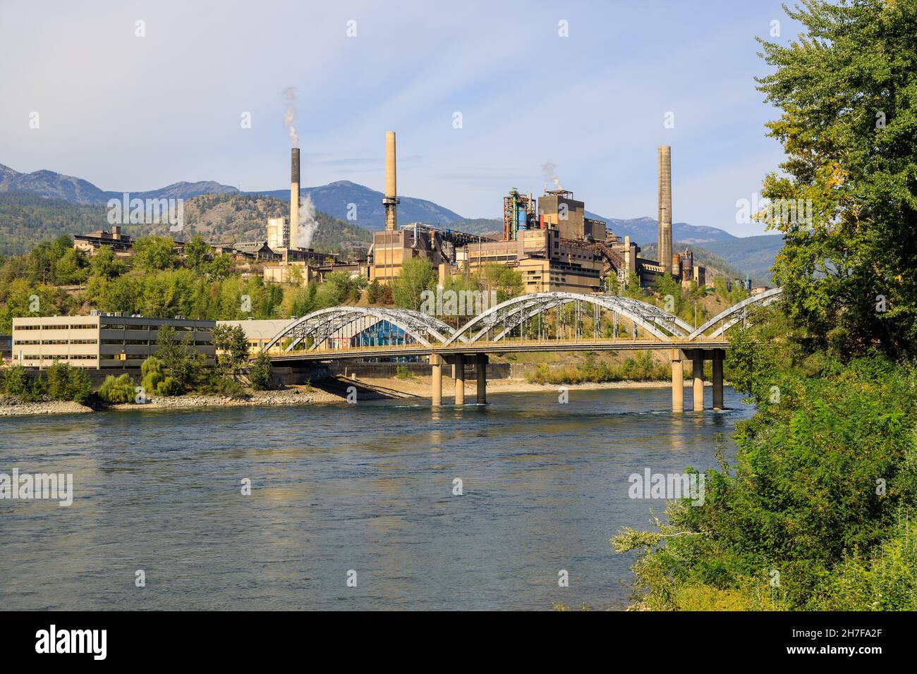 View of the city of Trail and the lead and zinc smelter in the West Kootenay, British Columbia, Canada. Stock Photo