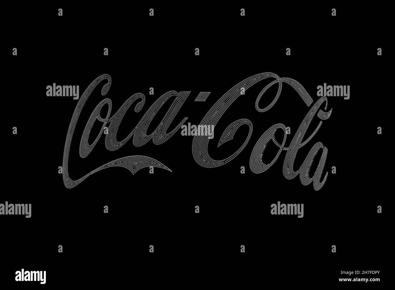 Almaty, Kazakhstan - november 20, 2021: The Coca-Cola logo glows white with LEDs in the dark. Night advertising Stock Photo