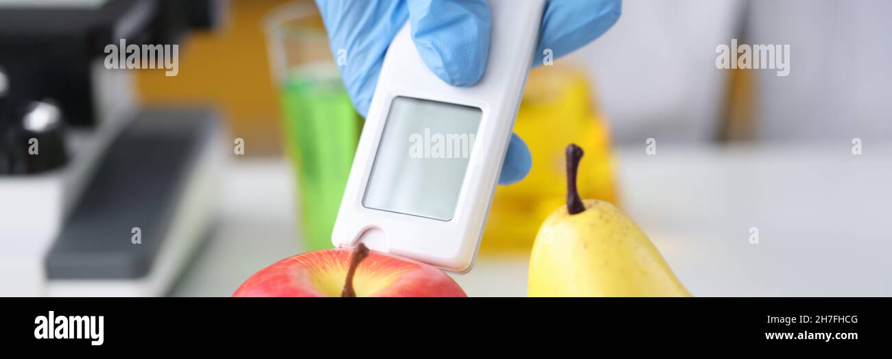 Use nitrate tester for fruits and vegetables Stock Photo