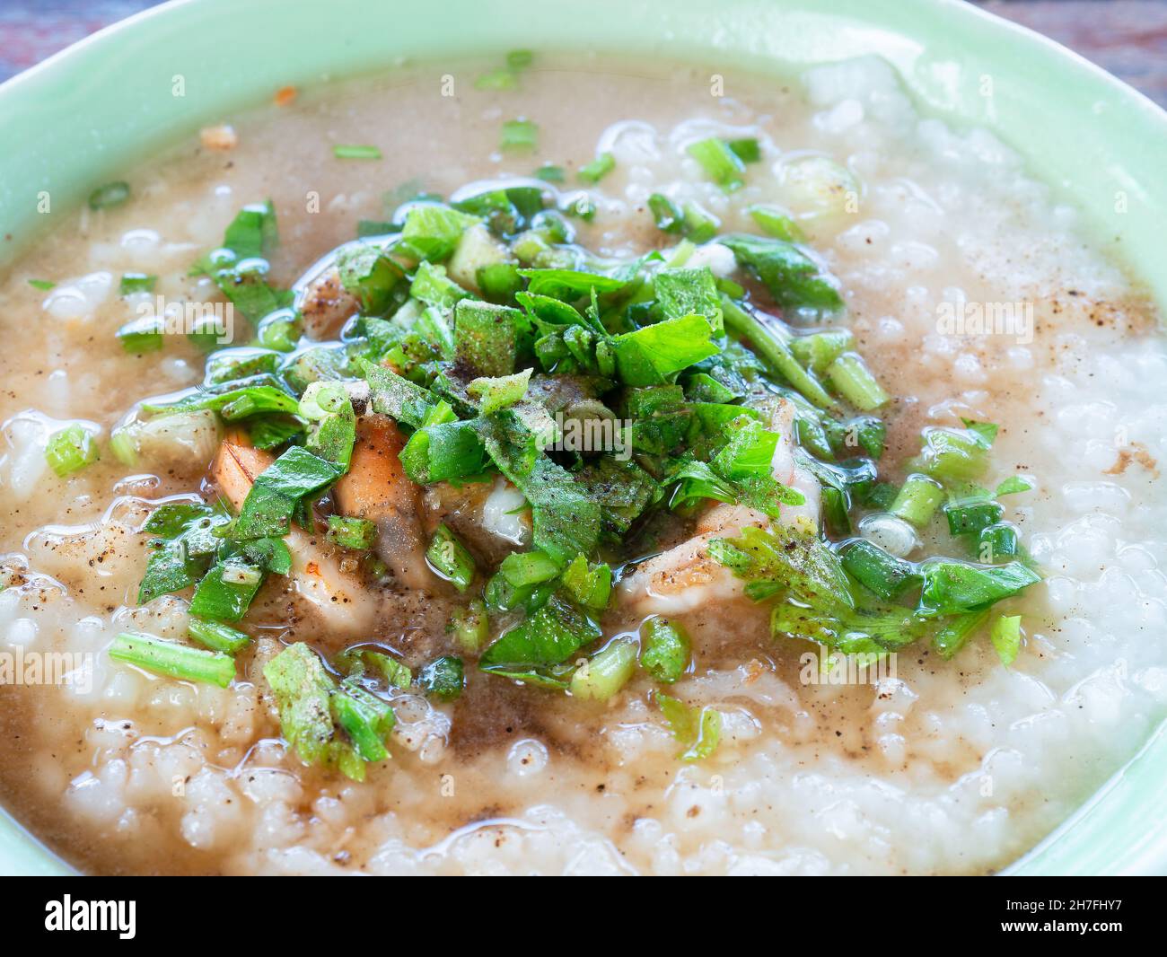 Thai rice soup, khao tom, with condiments and shrimps. Khao tom is classic Thai breakfast and consists clear broth with boiled assorted Stock Photo - Alamy