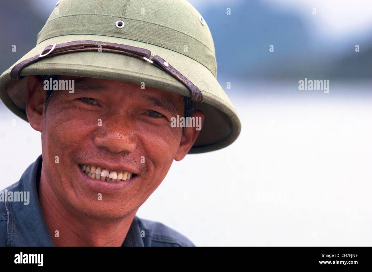VIETNAM, HA LONG, MAN ON THE HALONG BAY, ON THE HEARTH PART Stock Photo