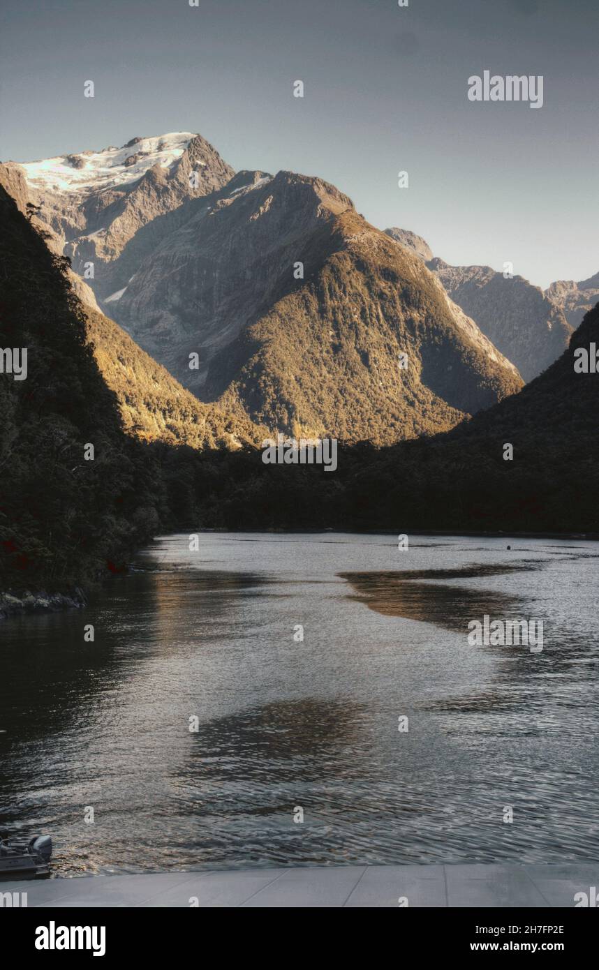 Snowy mountains close to Milford Sound in New Zealand Stock Photo