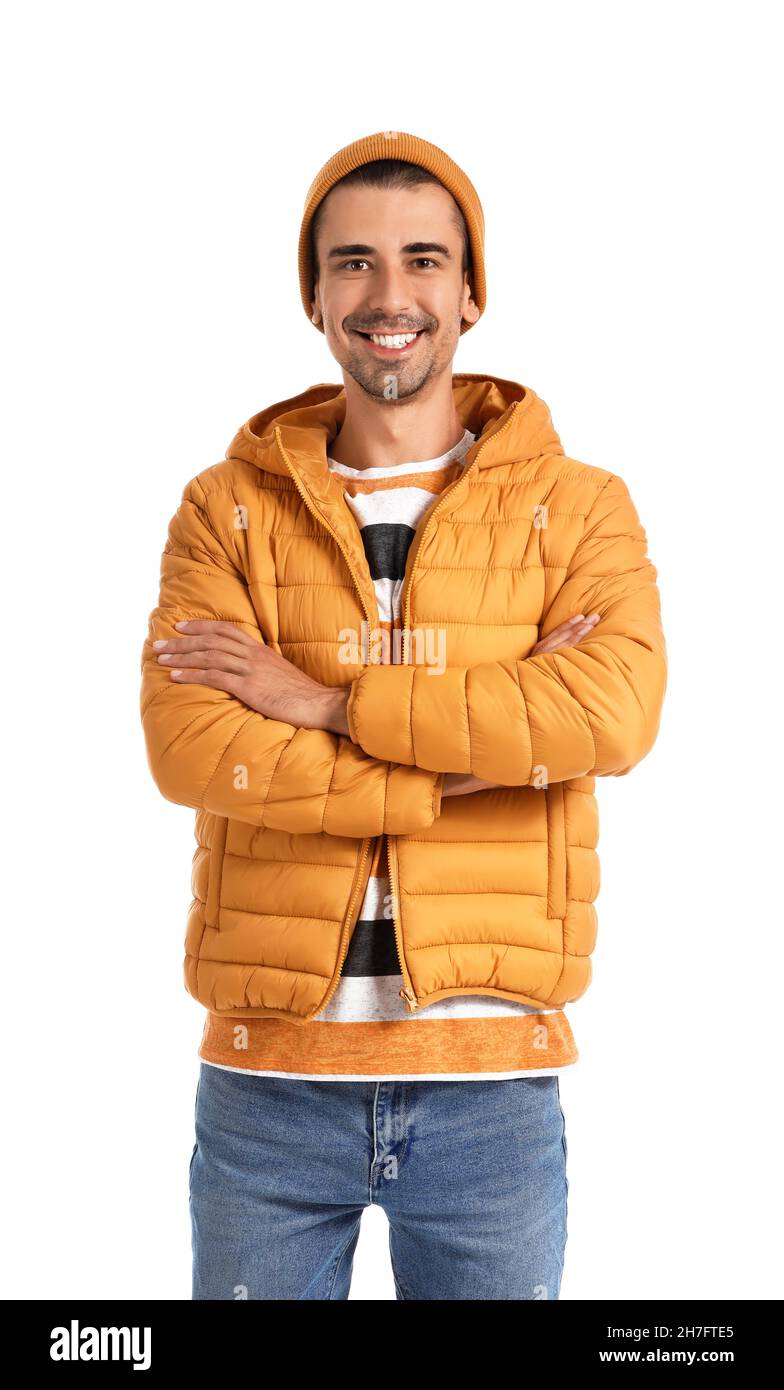 Young man in yellow hat and jacket on white background Stock Photo Alamy