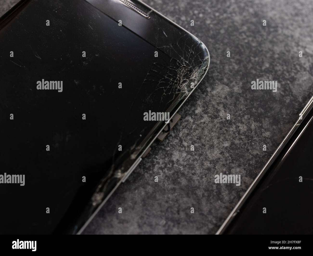 Broken mobile phone screen, black, white, clipping path. Smartphone