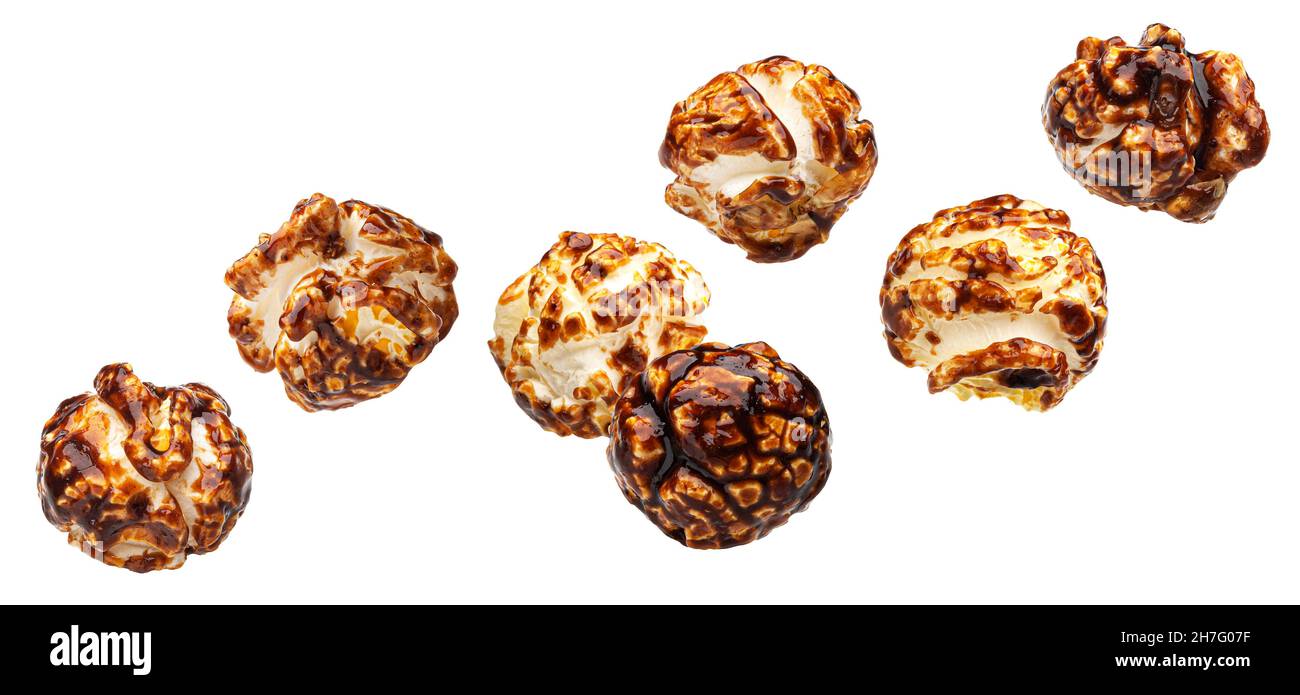 Falling chocolate pop corn isolated on white background Stock Photo