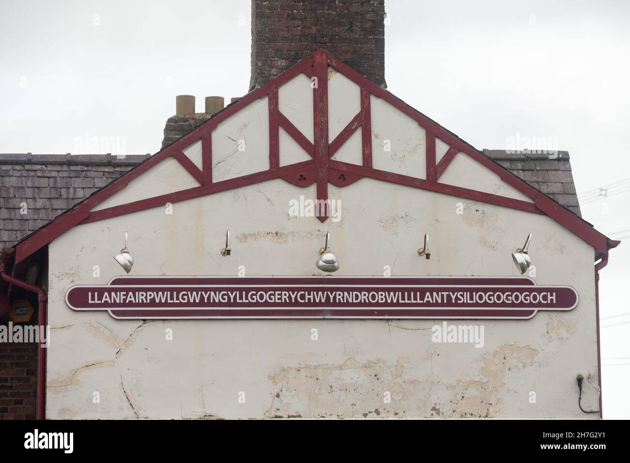 train station at Llanfairpwllgwyngyllgogerychwyrndrobwllllantysiliogogogoch anglesey wales, the longest name. Stock Photo