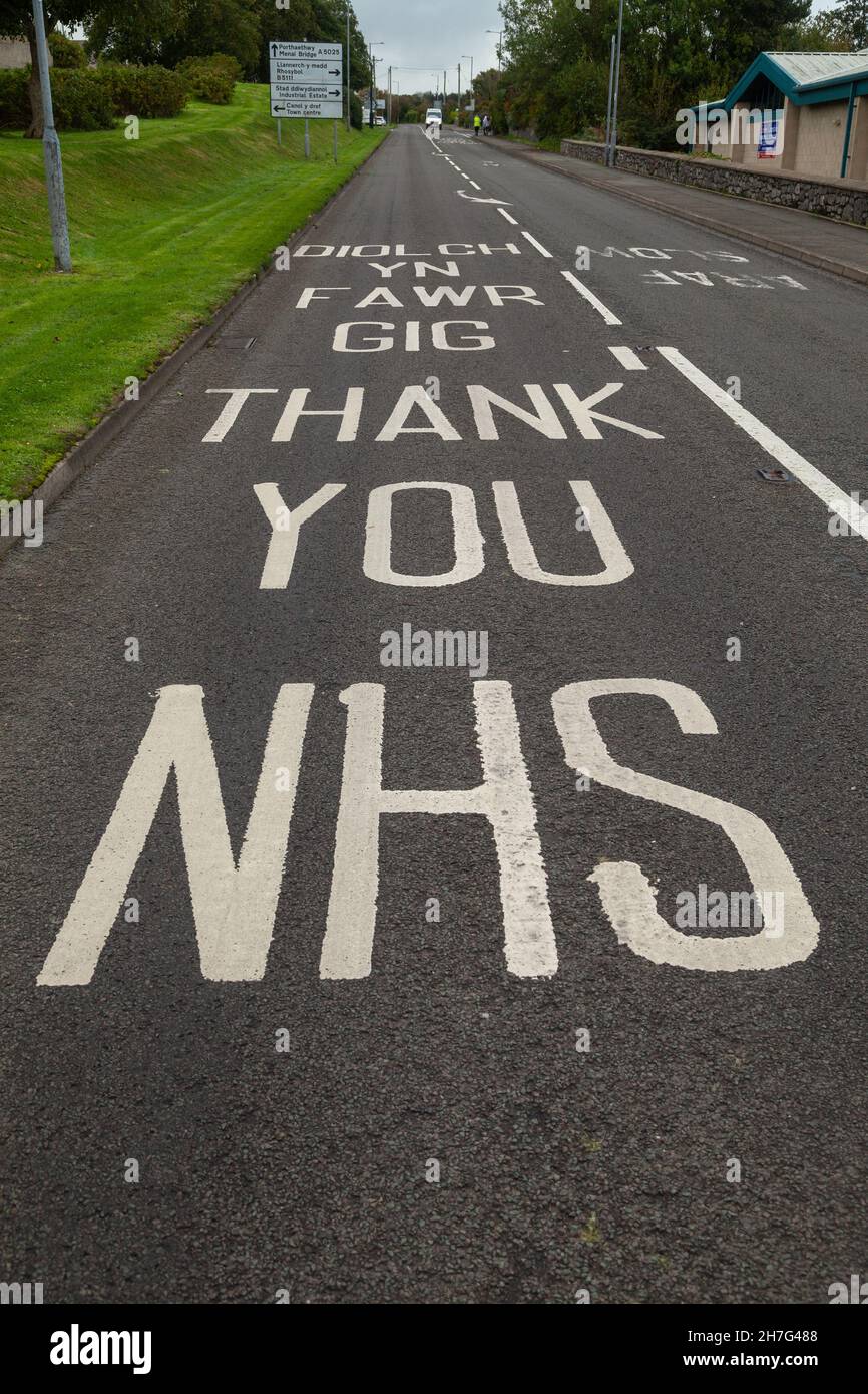 A sign saying Thank you NHS painted on a road in Anglesey, Wales. Stock Photo