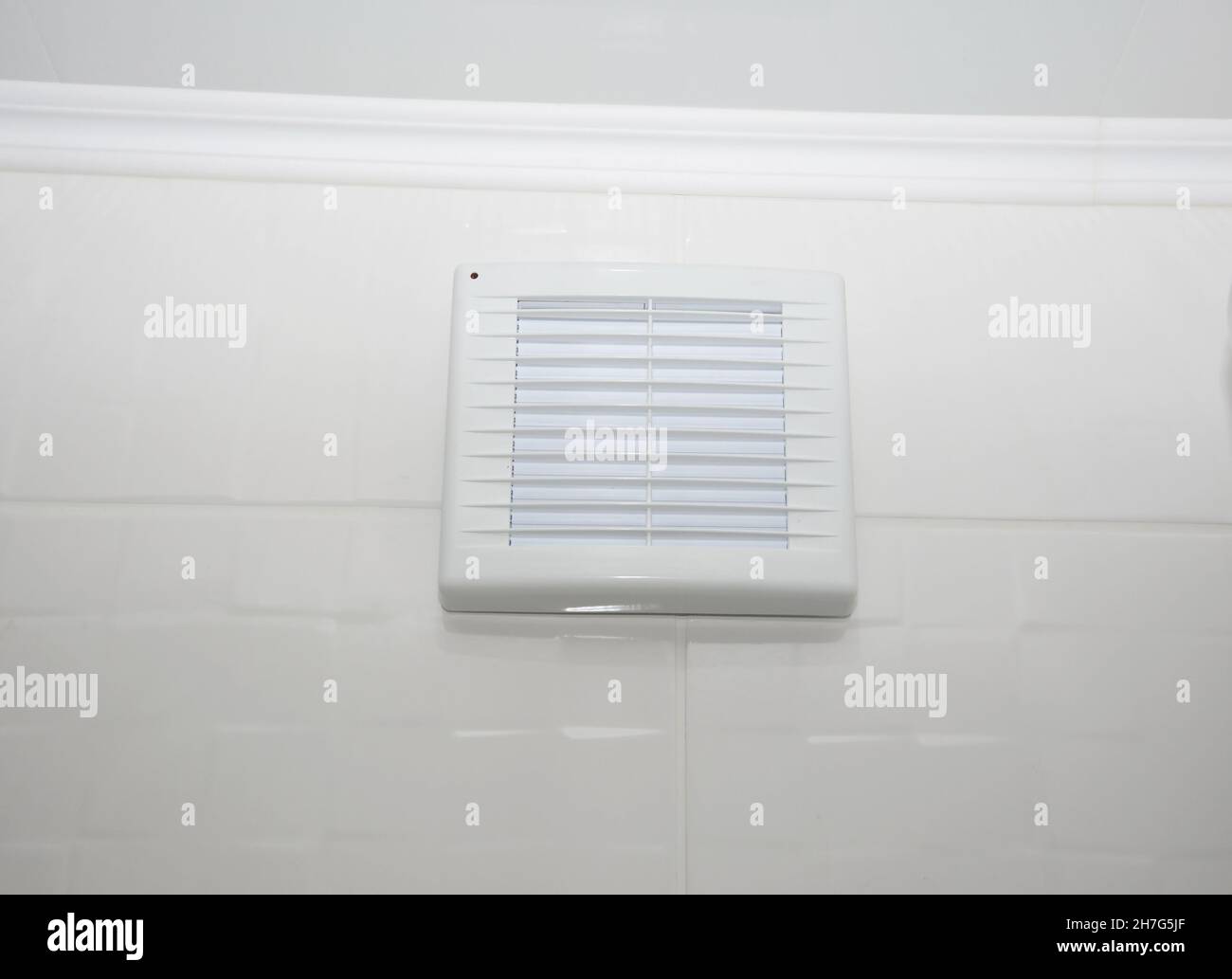 A closeup of a bathroom vent fan, exhaust fan, bathroom ventilation