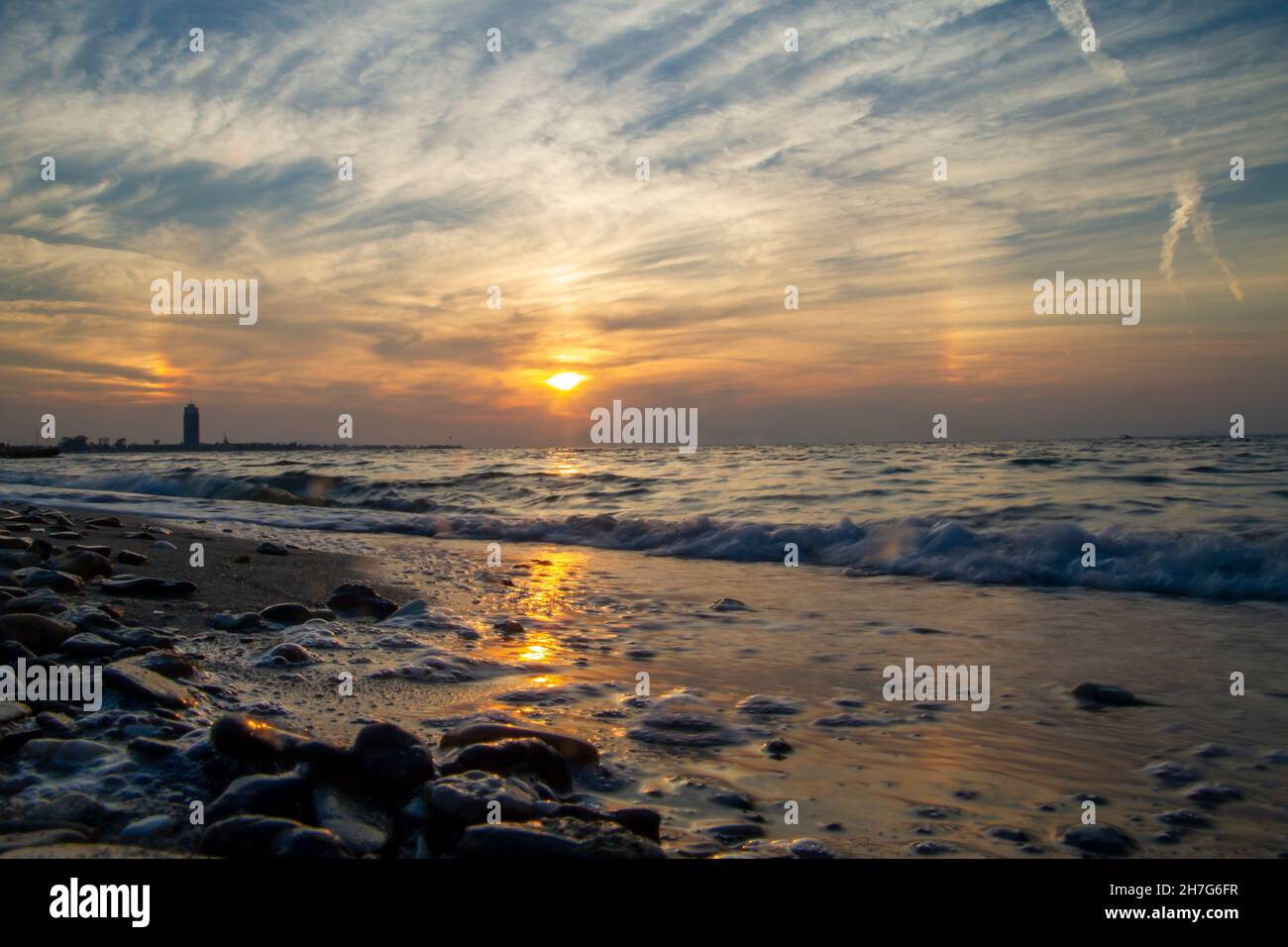 Evening sky with dramatic clouds over the sea. Dramatic sunset over the ...