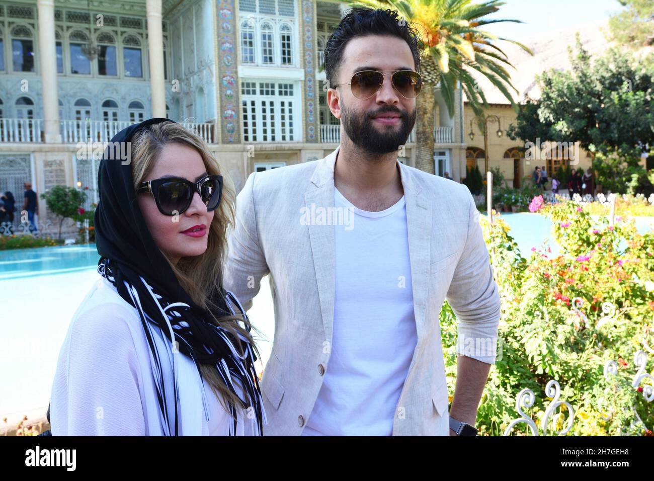IRAN. SHIRAZ. PORTRAIT OF BENJAMIN, A POPULAR IRANIAN SINGER WITH A FAN