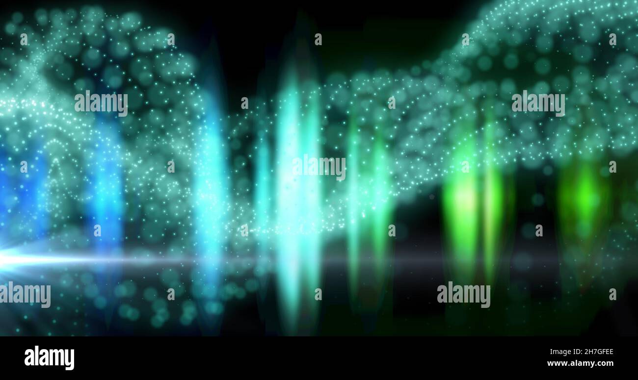 Image of glowing blue particle form with blue and green lights on black