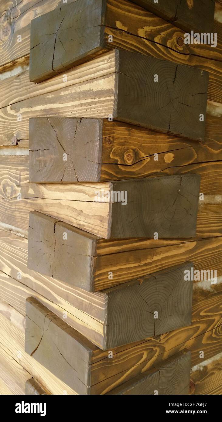 herringbone joint, traditional carpenter's joints, brown wood on the corner of the timber house Stock Photo