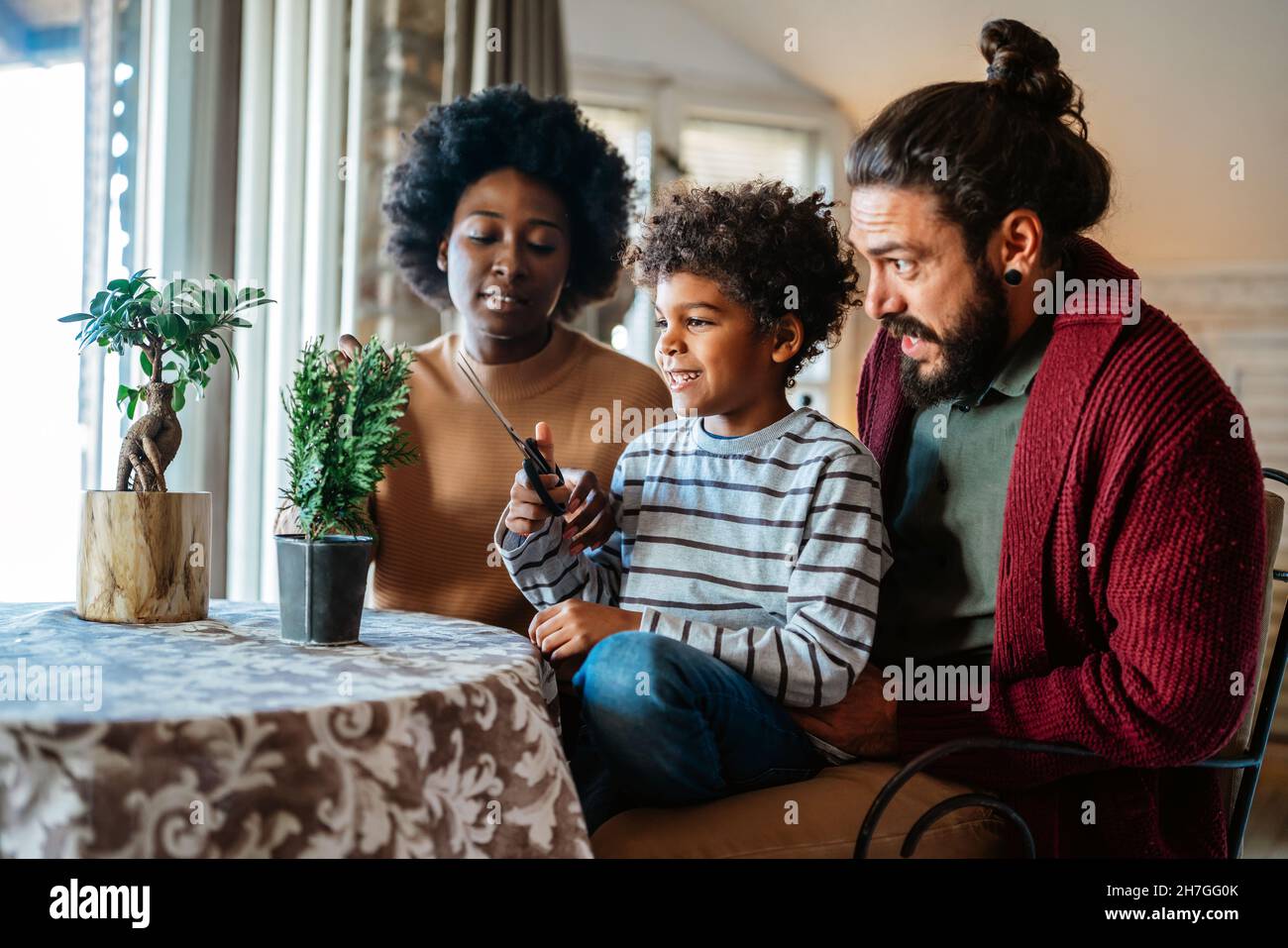 Home hobbies gardening with children and learning botany. Family love happiness concept Stock Photo