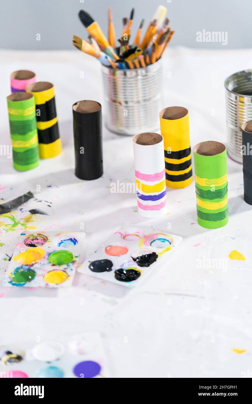 Making different bugs out of empty toilet paper rolls during ...