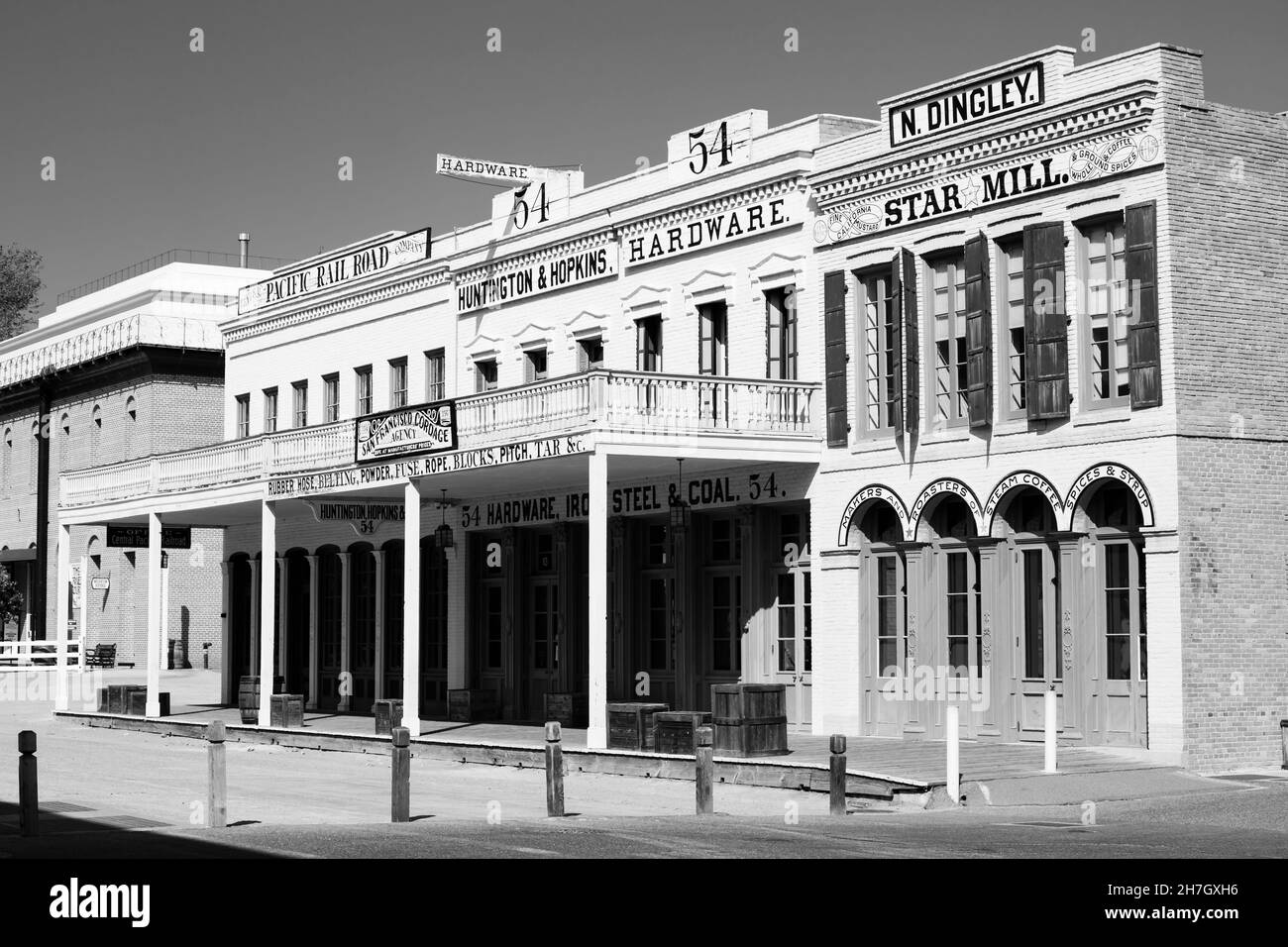 Black and white, monochrome image of Old Sacramento western buildings. Hardware store, Pacific railroad, mill.California, USA Stock Photo