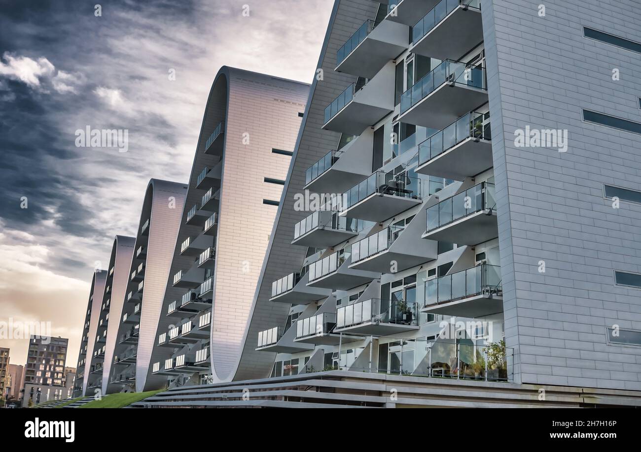 The wave boelgen iconic modern apartments in Vejle, Denmark Stock Photo