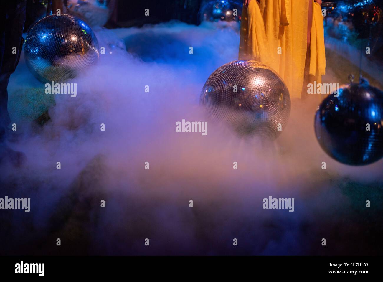 Disco ball in nightclub with fog  Stock Photo