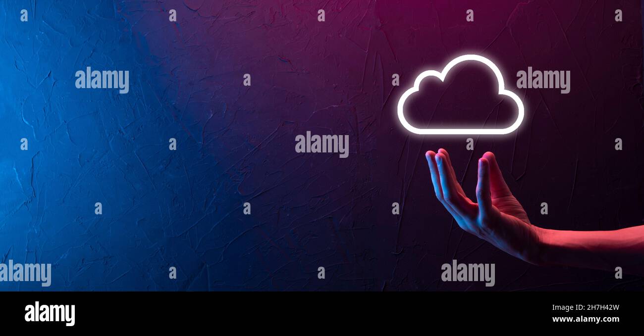 Hand holding icon cloud computing network and icon connection data information in hand. Cloud computing and technology concept Stock Photo